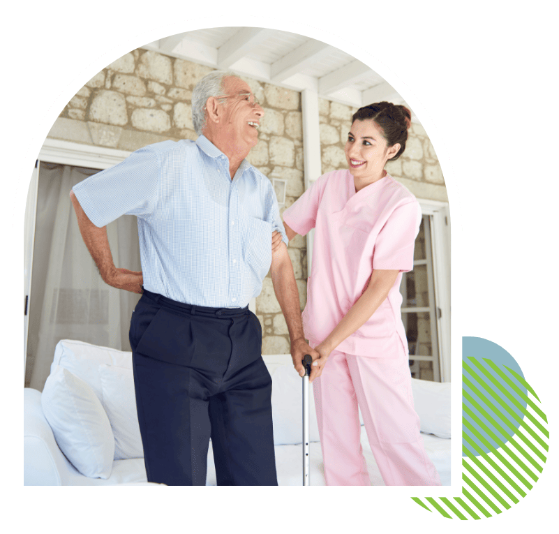 Caregiver assisting a senior man with specialized home care support in Putnam County, FL